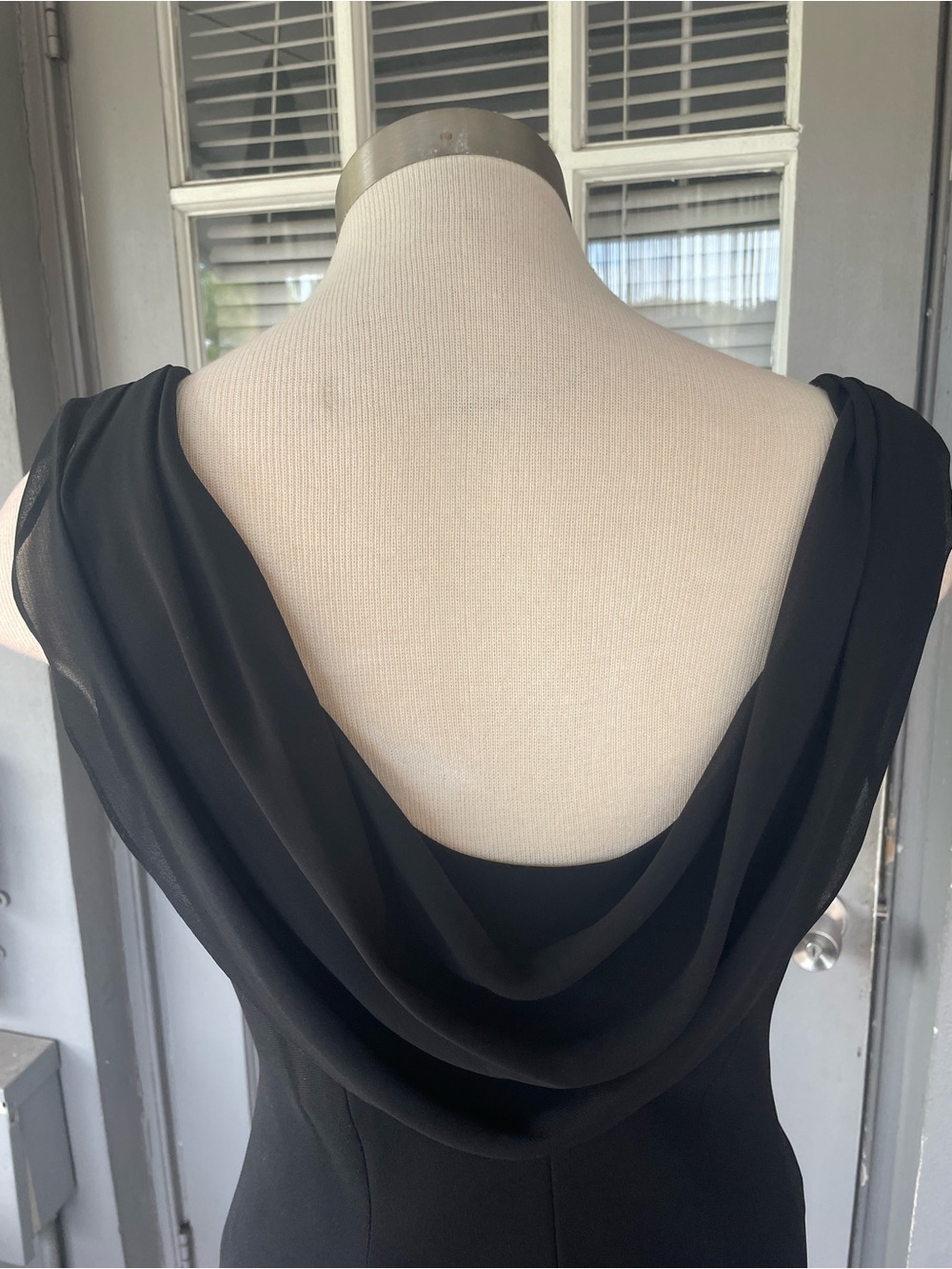 Elegant Black Sleeveless Evening Dress with Sheer Embellished Yoke - Picture 4 of 6